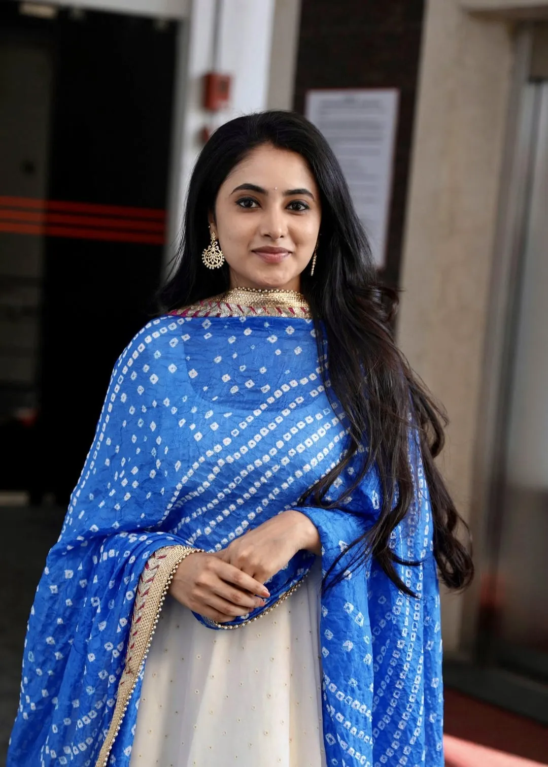 Priyanka Mohan in a White And Blue Dress Looking at Camera