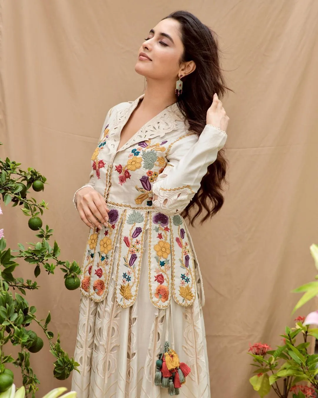 Priyanka Mohan in a White Dress with a Flower Design Image