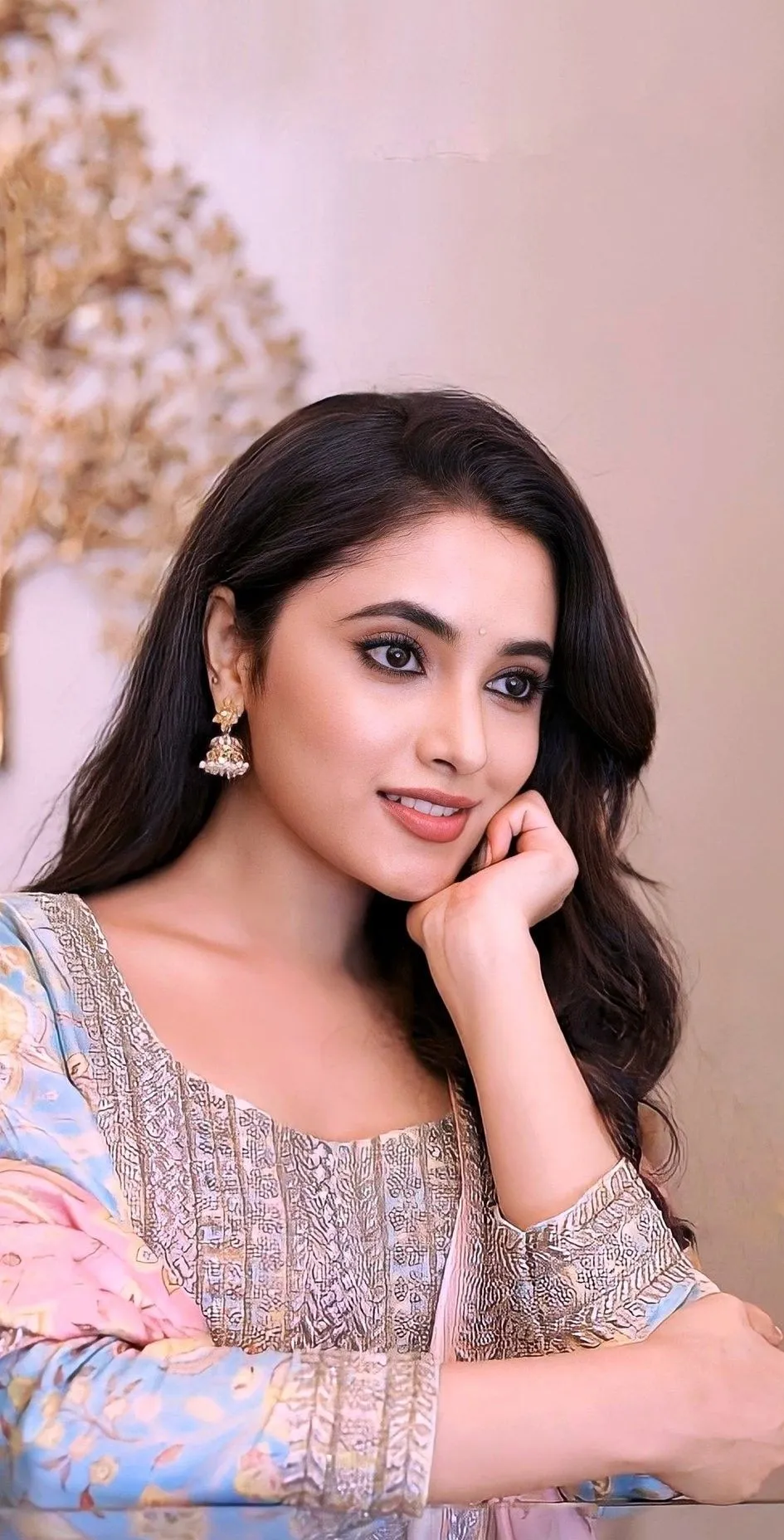Priyanka Mohan in a White Dress with Her Hand on Her Chin