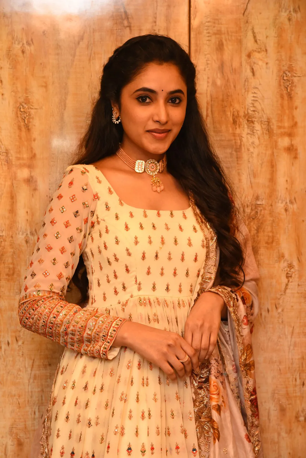 Priyanka Mohan in a Yellow Dress with Holding Her Hand