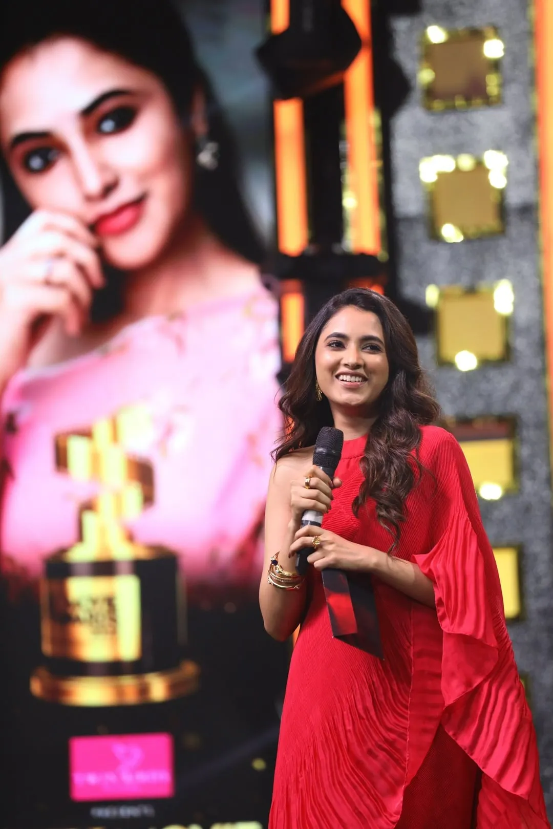 Priyanka Mohan in an Award Function Holding Mike with Smile