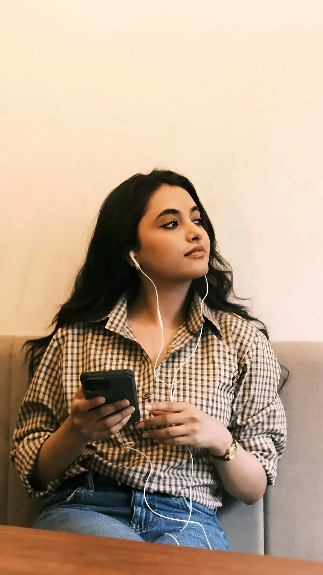 Priyanka Mohan in Checked Shirt Hearing Song with Headphones