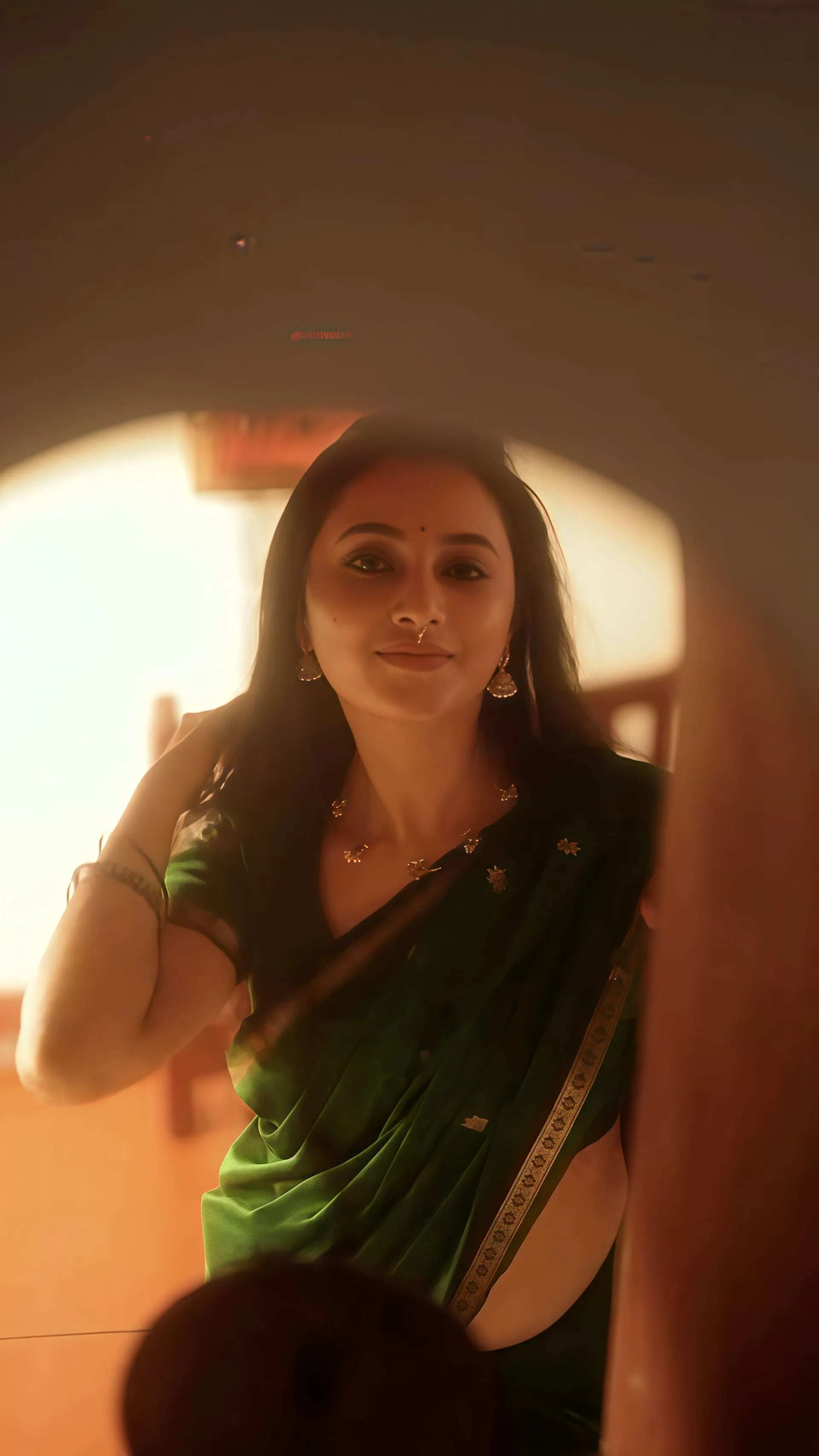 Priyanka Mohan in a Green Saree Standing in Front of Mirror