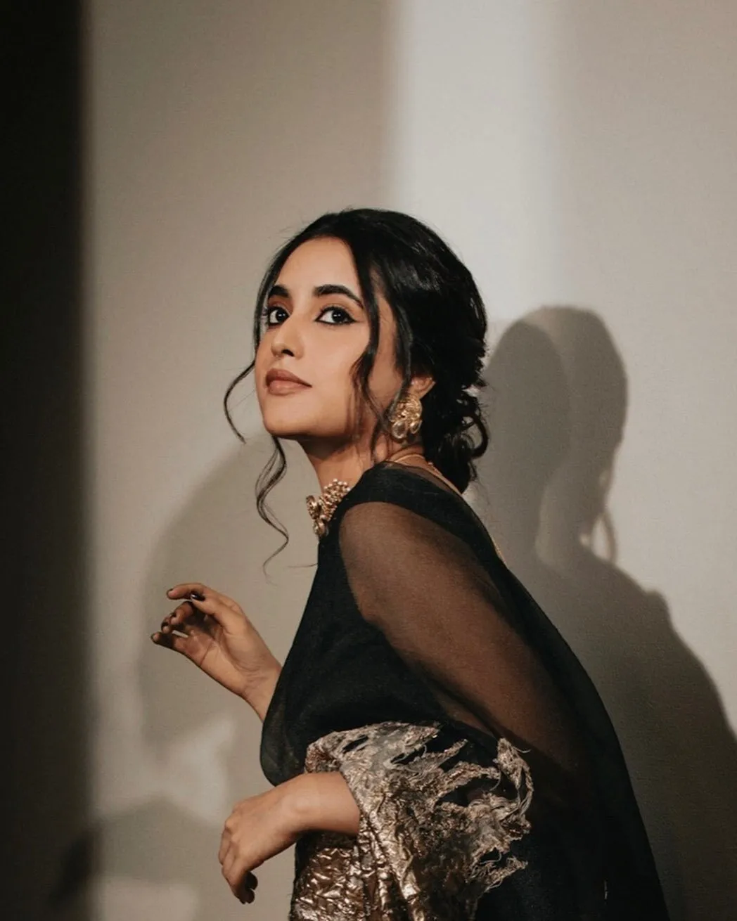 Priyanka Mohan in stylish black outfit with confident pose