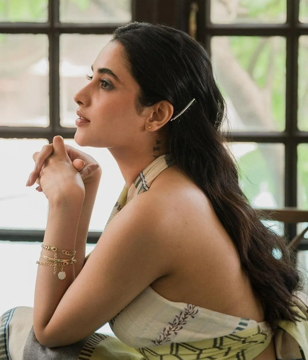 Priyanka Mohan Sitting Near Window with Hand Holding Pose