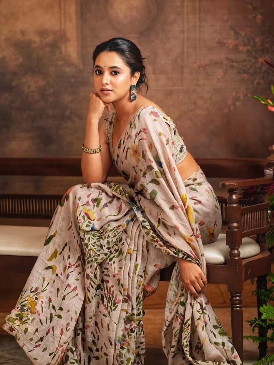 Priyanka Mohan Sitting on a Wooden Bench Wearing a Saree