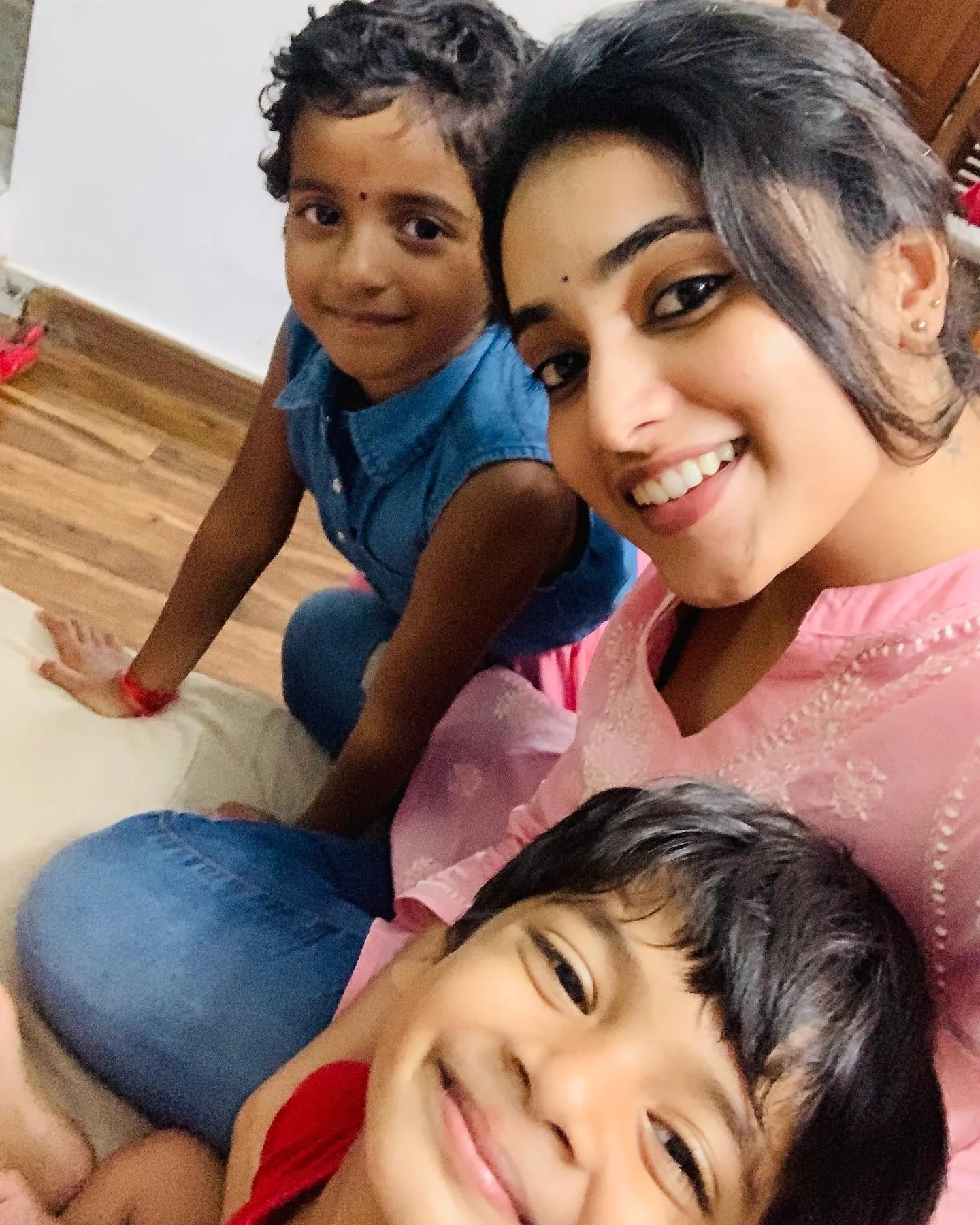 Selfie Image of Priyanka Mohan with Two Kids with a Smile