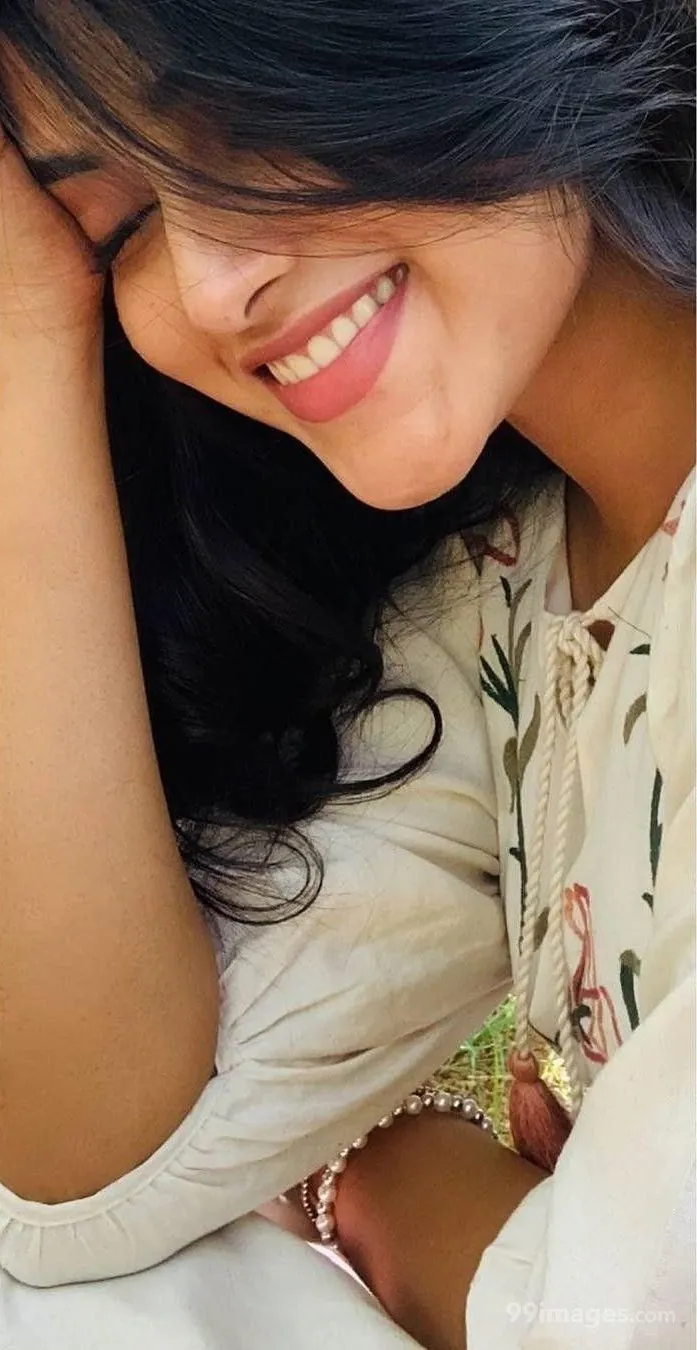 Smiling Priyanka Arul Mohan Wearing beautiful white Outfit