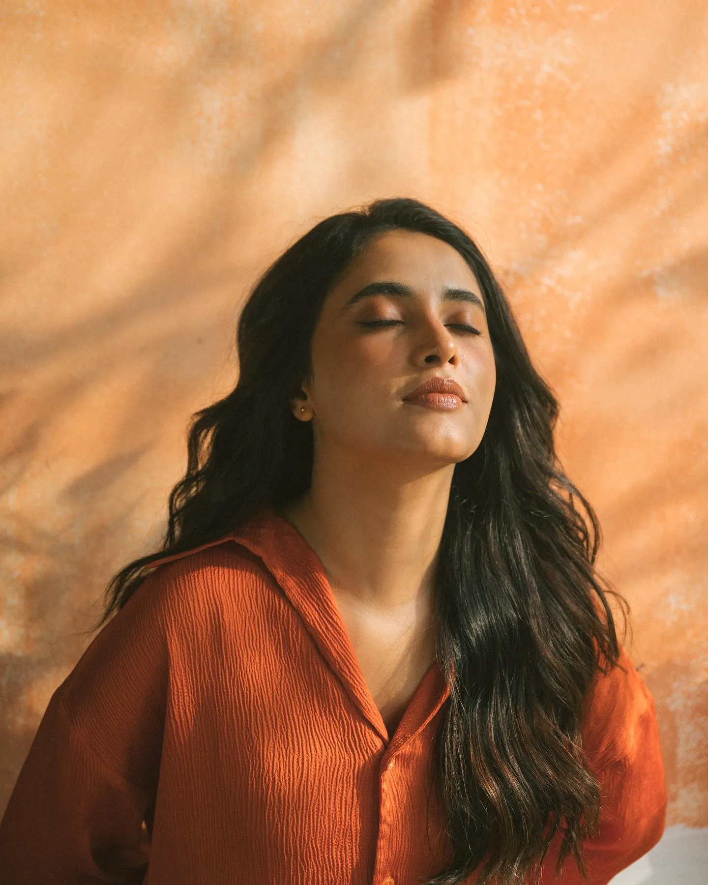 Stunning Wallpaper of Priyanka Mohan in an Orange Dress