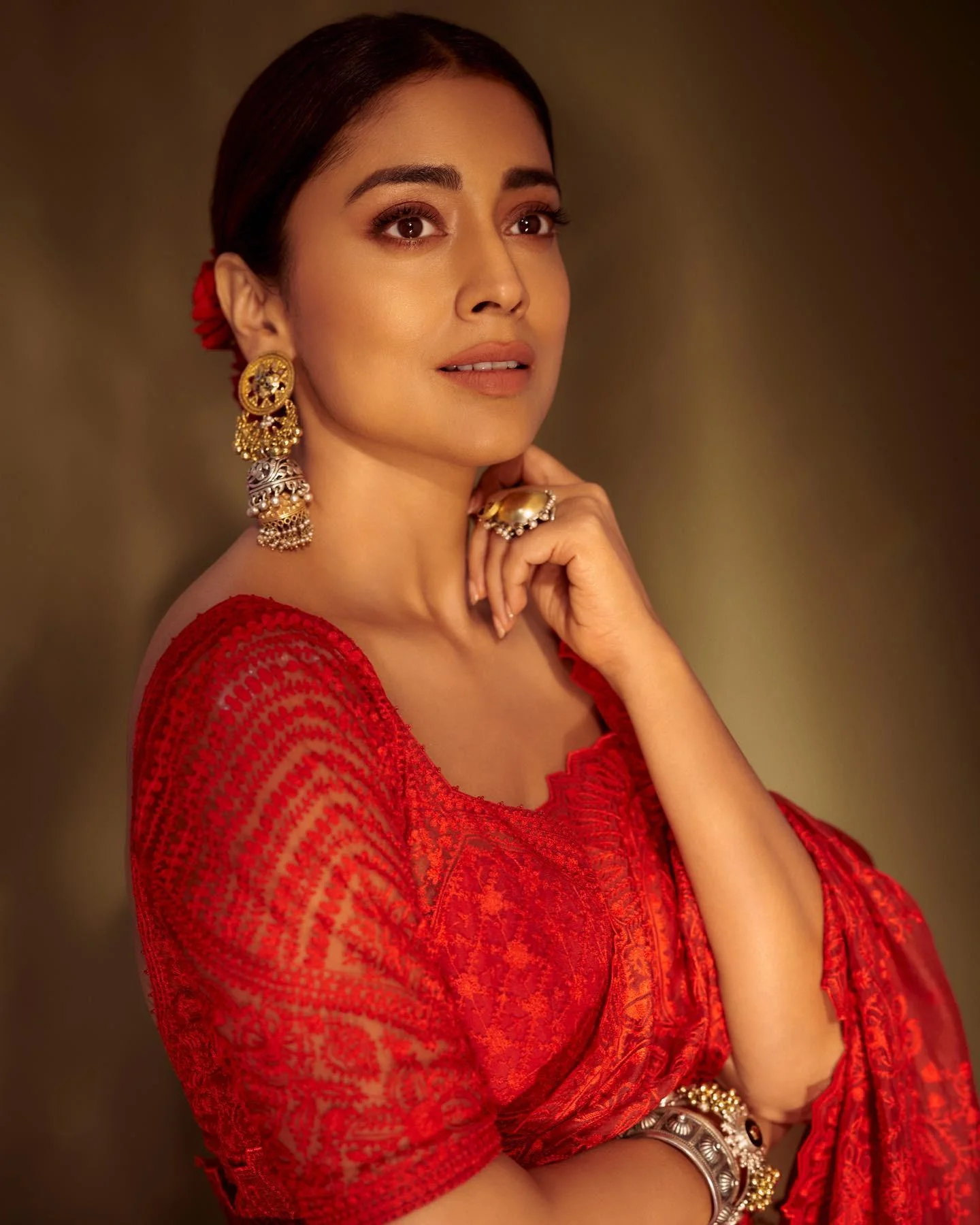 Shreya in Red Saree With Cute Reaction Hd Wallpaper