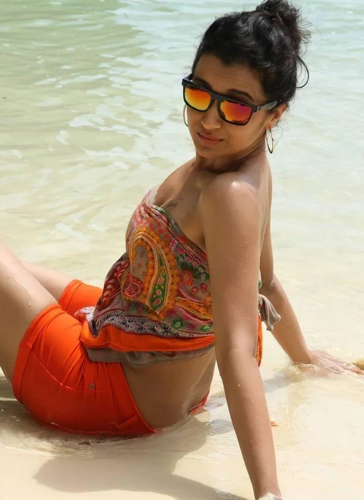 Actress Trisha Krishnan Stunning Beach Look in Orange Shorts