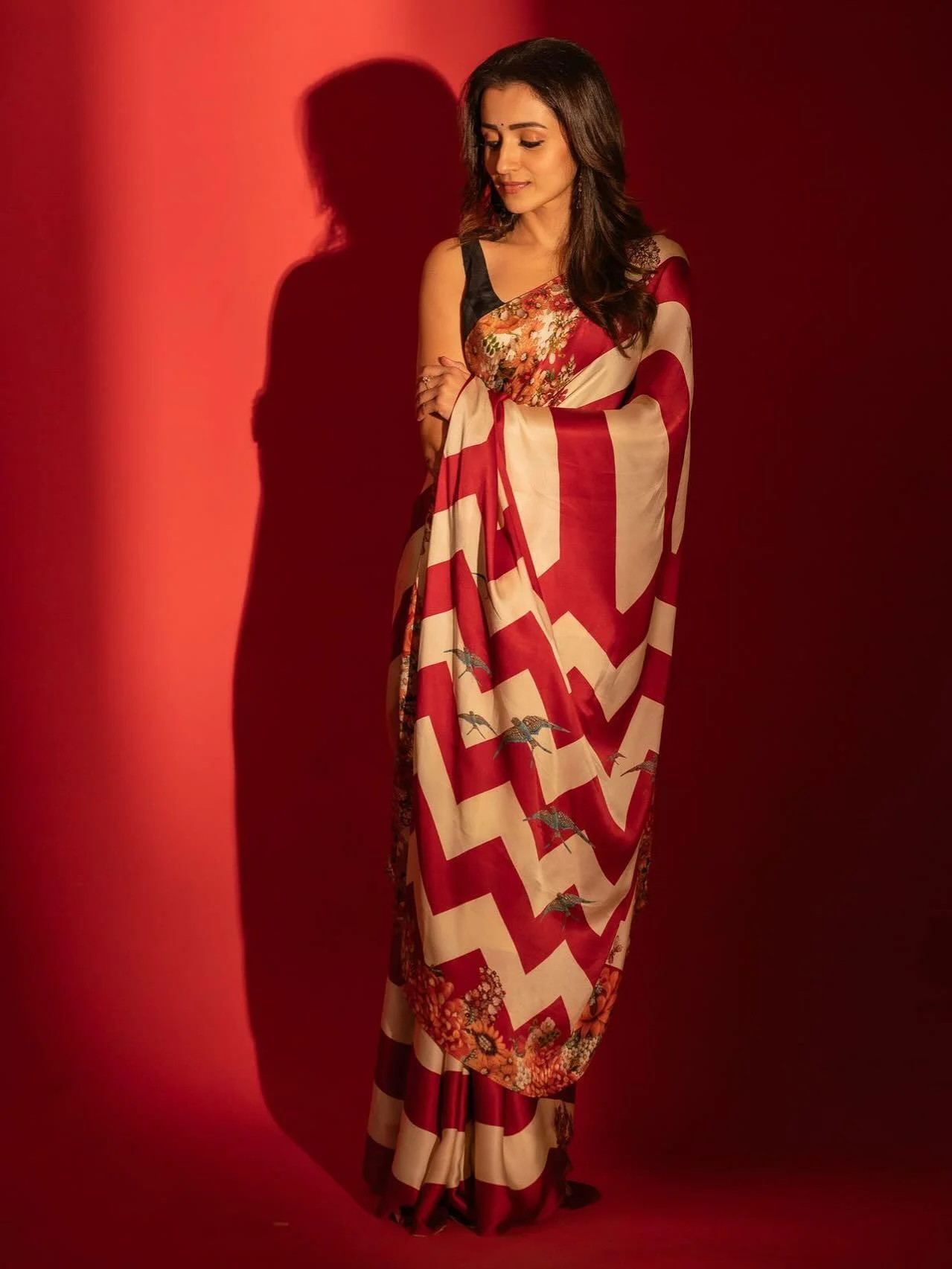 Trisha Krishnan Radiates Grace in Red Ethnic SareeHd Image