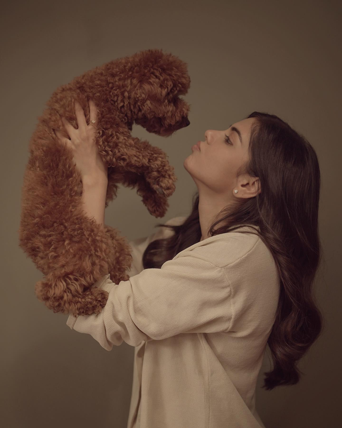 Candid Moment with Dog and Kalyani Priyadarshan Photo