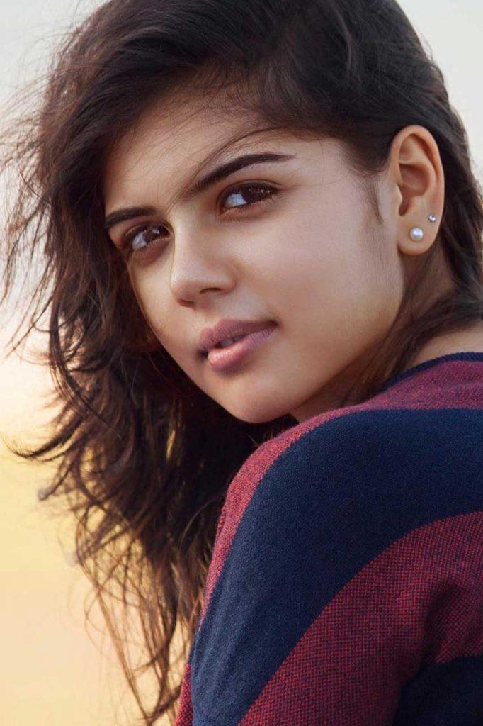 Image of Priyadarshan in Striped Top with Windswept Hair