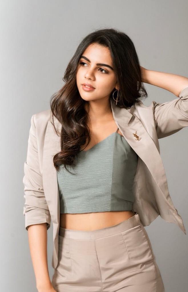 Confident Kalyani in Light Pantsuit Posing free Image