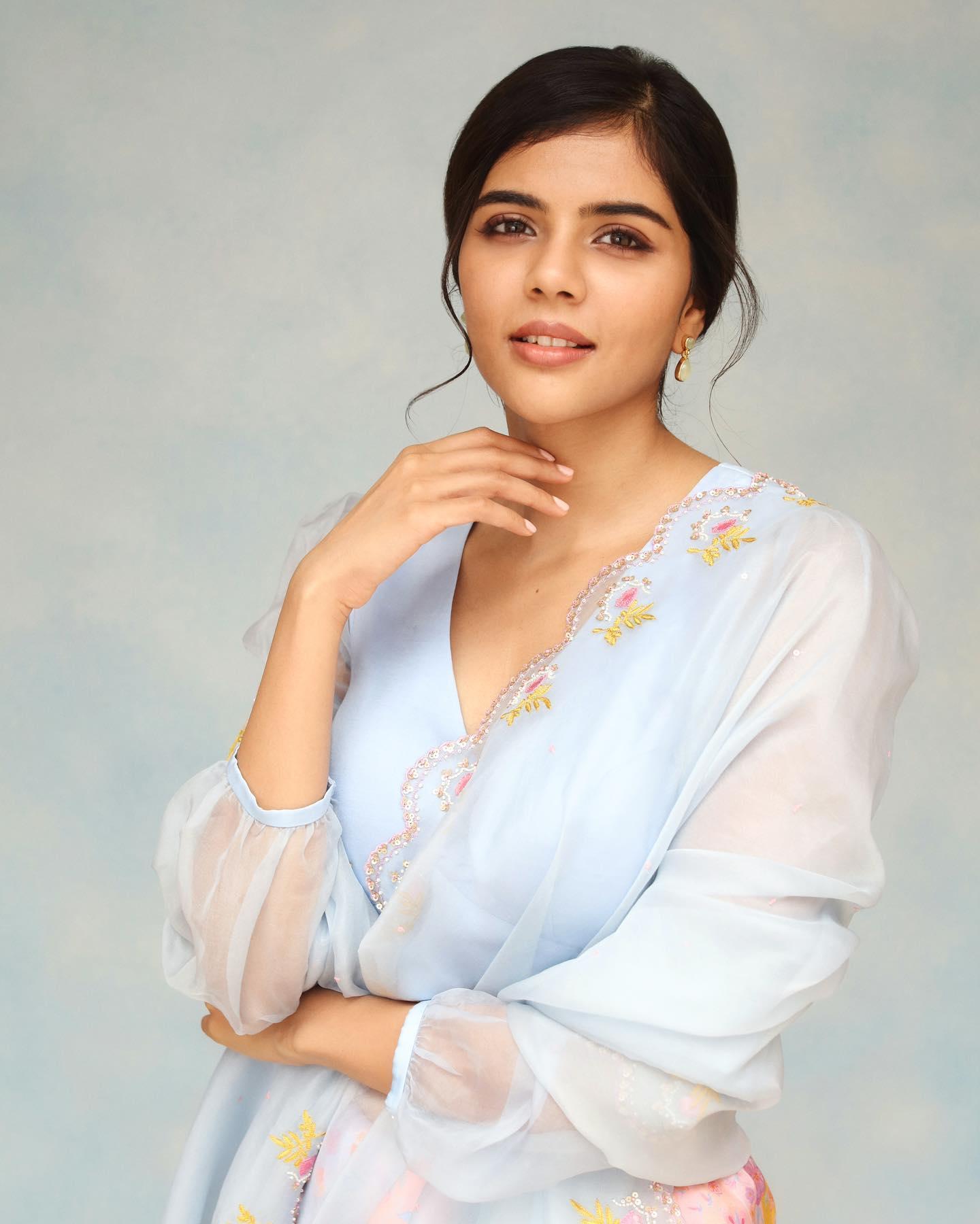 Confident Kalyani in White Sheer Dress Soft Backdrop