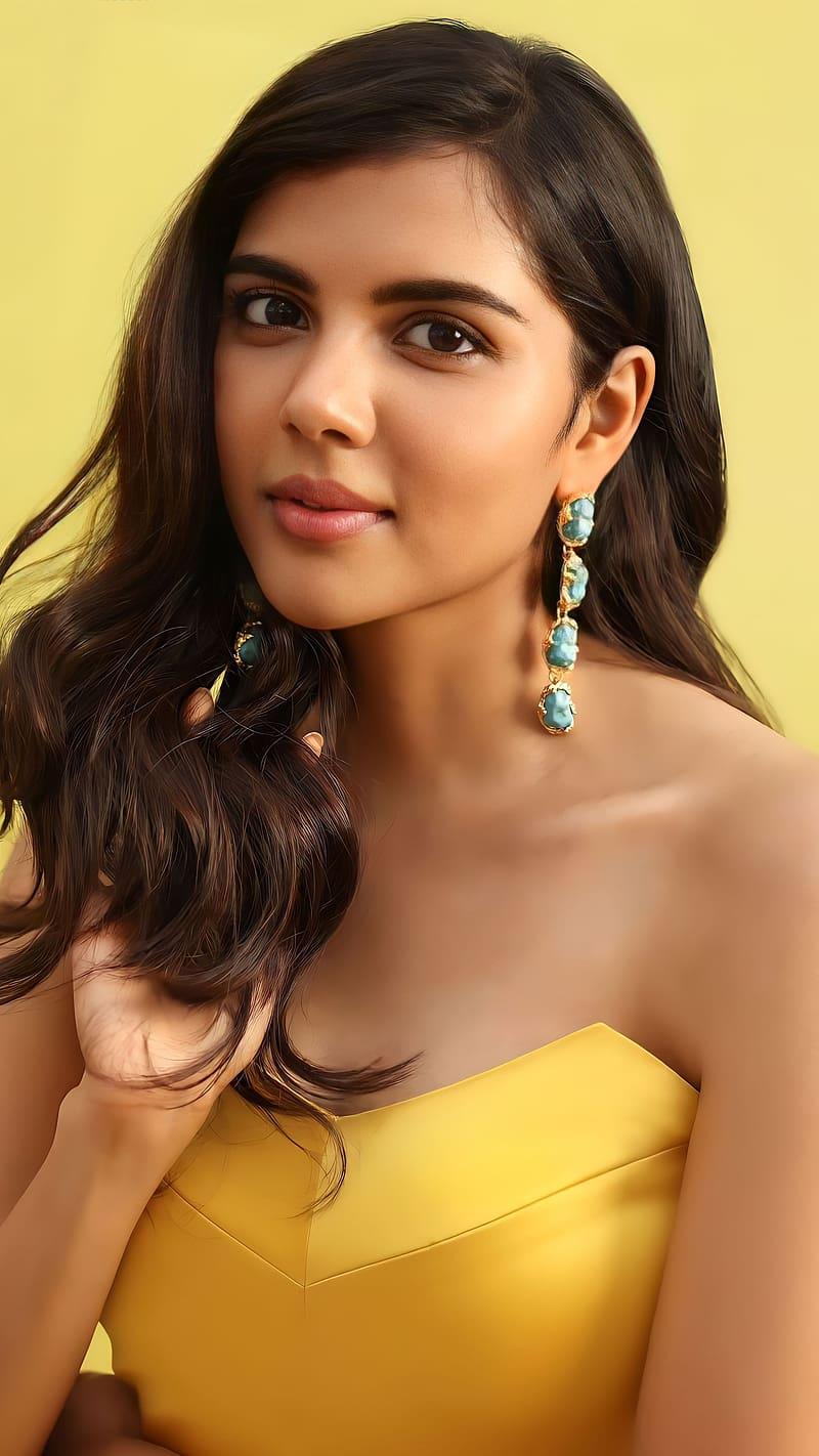 Confident Priyadarshan in Strapless Yellow Outfit Wallpaper