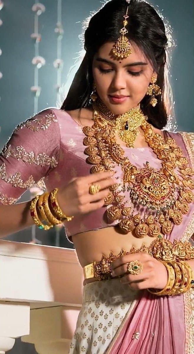 Elegant Bride in Pink Lehenga with Jewelry free Photo