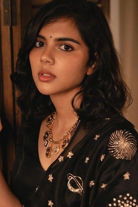 Kalyani Priyadarshan Cute look in Warm Black Dress