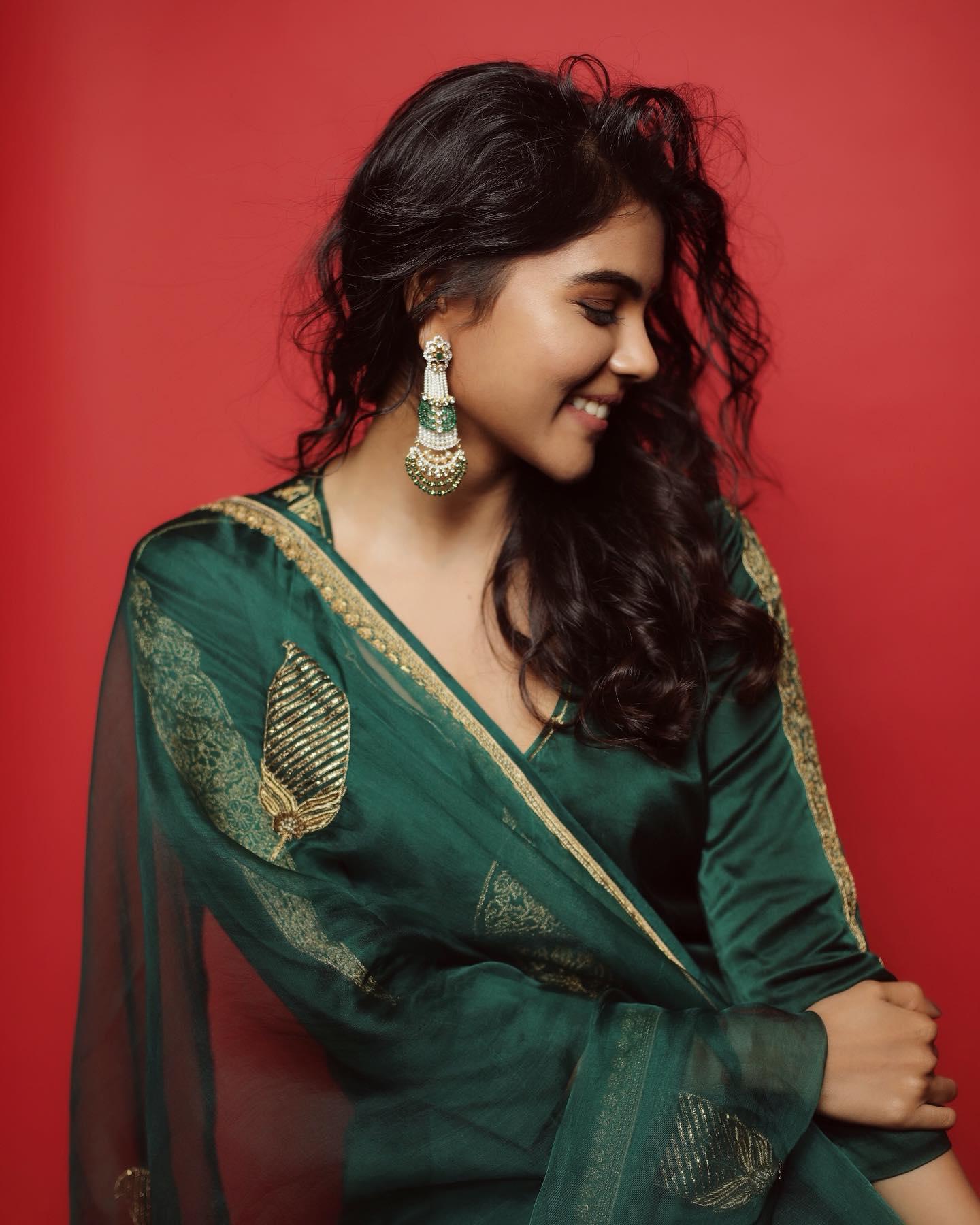 Photo of Kalyani Priyadarshan Smiling Face with Green Dress