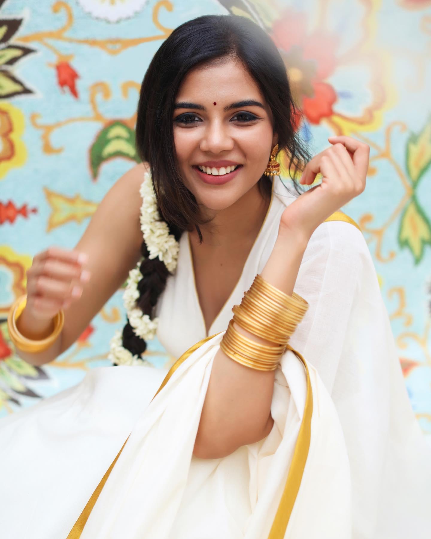 Joyful Kalyani in White and Gold Kerala Saree Look Photo