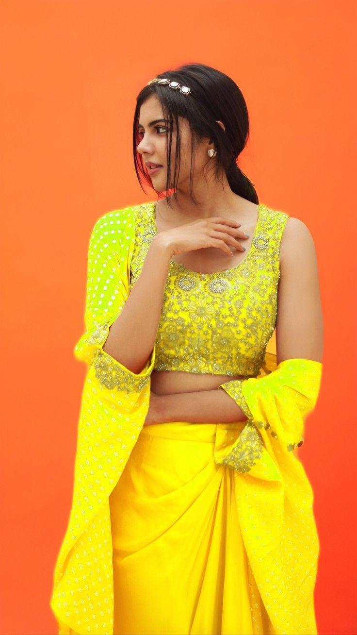 Kalyani in Bright Yellow Lehenga Posing Sideways Image