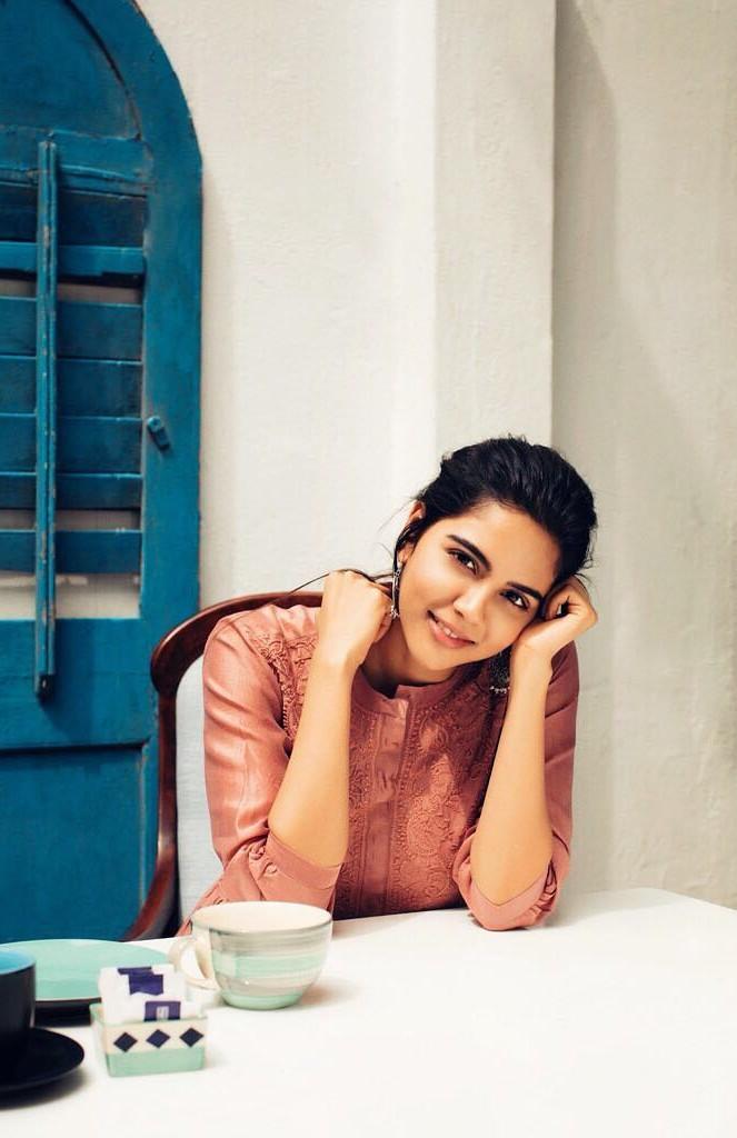 Kalyani in Brown Dress Sitting by Blue Door free Image