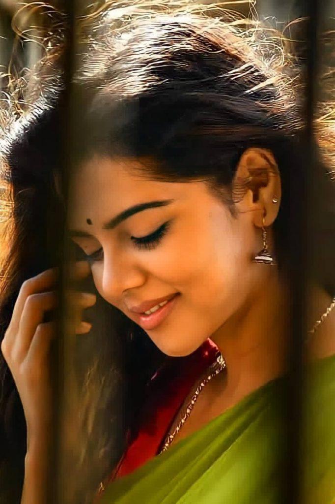 Kalyani in Green Saree with Shy Smile and Bindi Image