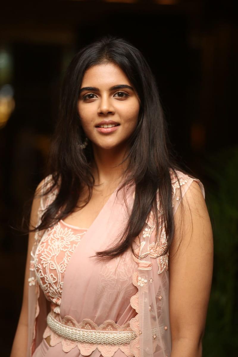 Kalyani in Soft Pink Dress Smiling at Night Event Photgraphy