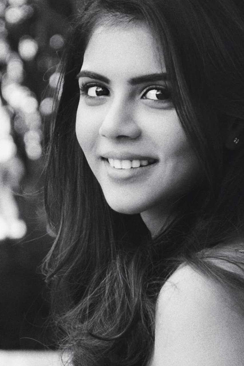 Kalyani Priyadarshan Black and White Smiling Face Photo