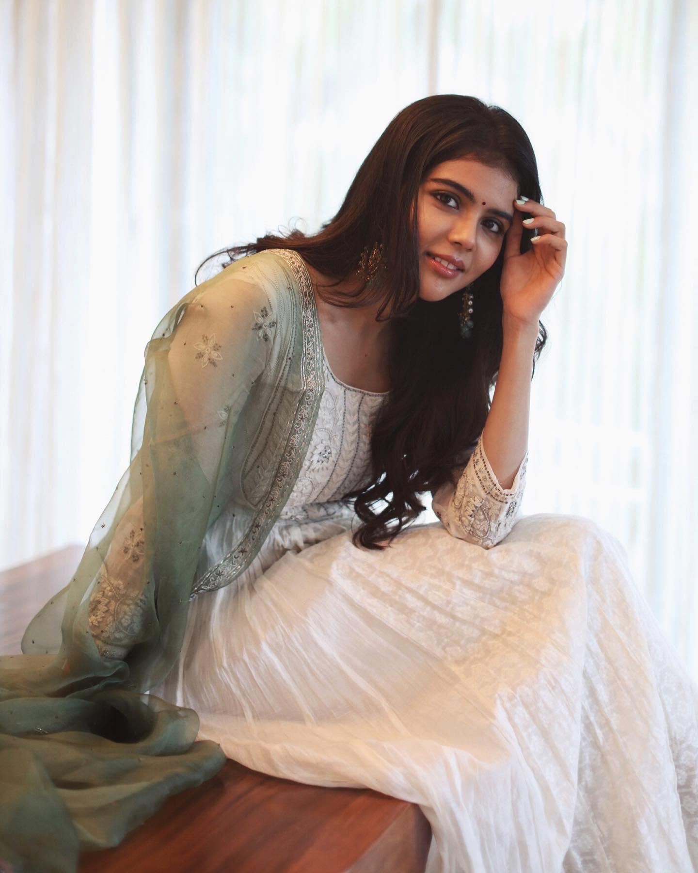 Kalyani Priyadarshan in a Light Blue Dress Sitting Photo
