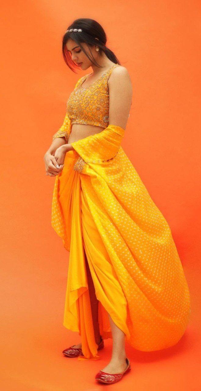 Kalyani Priyadarshan in Orange Lehenga Looking Down Pic
