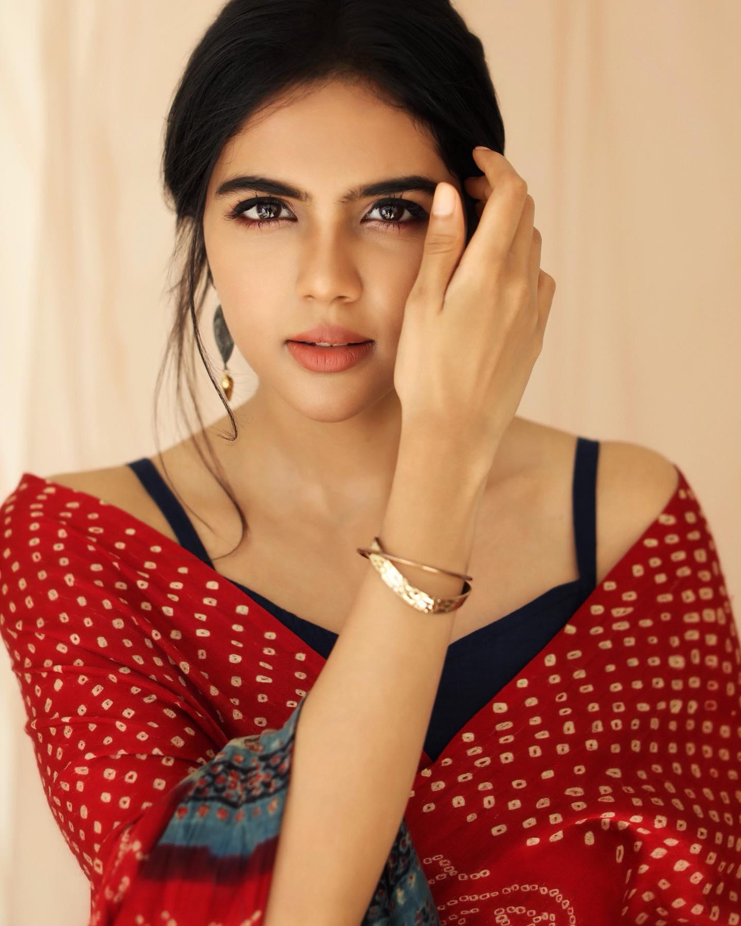 Kalyani Priyadarshan in Red and Black Dress Image Wallpaper