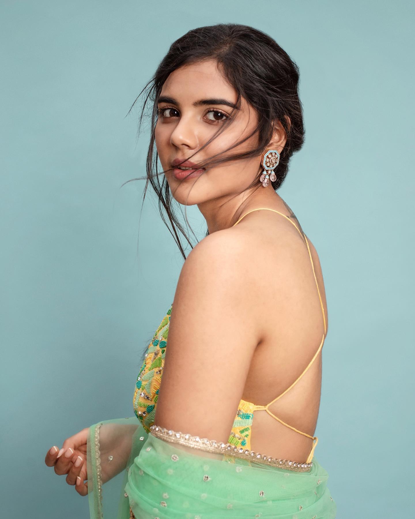 Kalyani Priyadarshan in Teal Green Blouse and Bun Back Shot