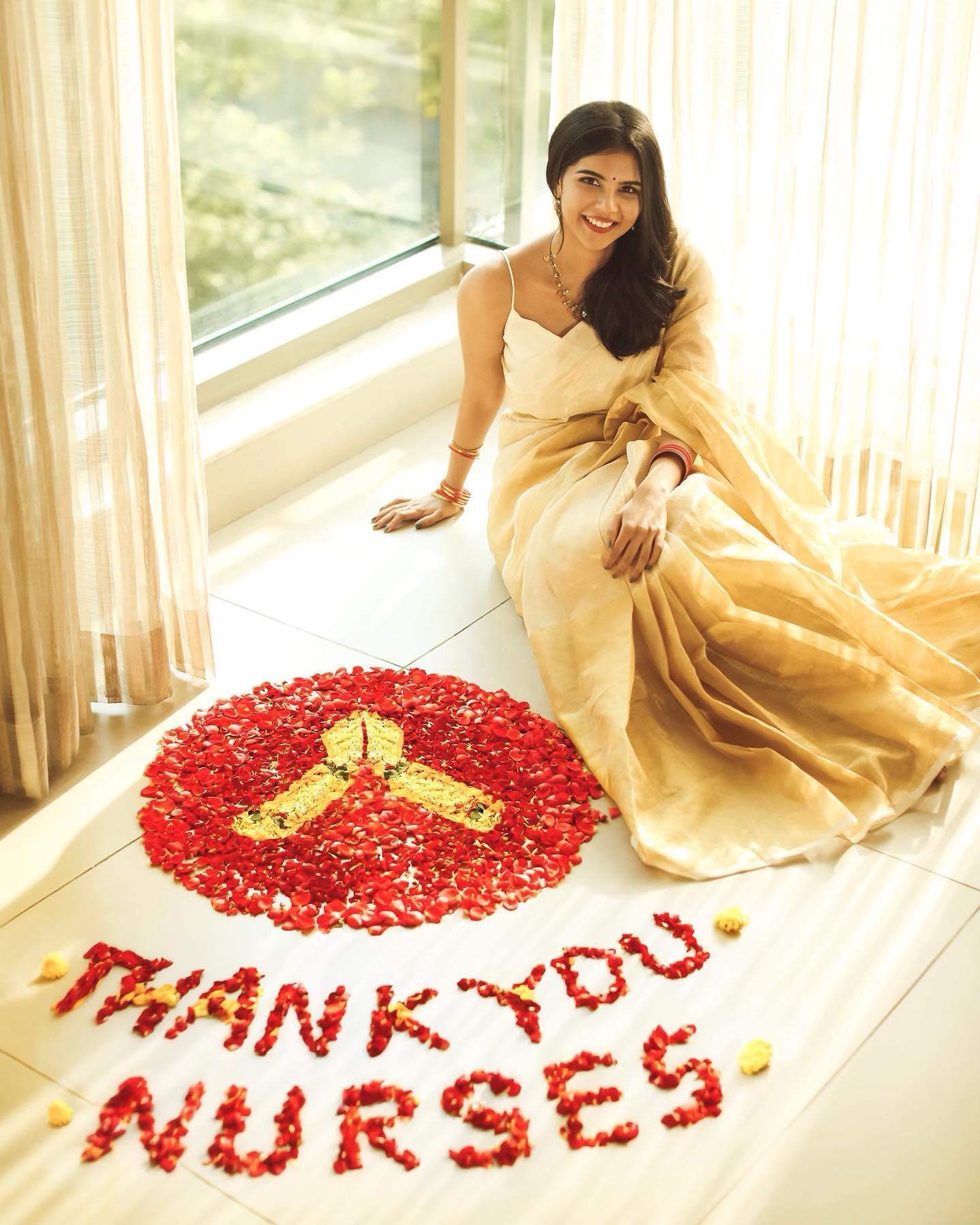 Kalyani Priyadarshan in Traditional Dress with Flowers Image