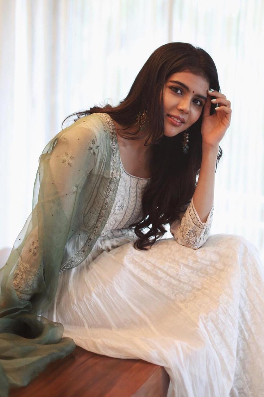 Kalyani Priyadarshan in White and Gray Dress Wallpaper