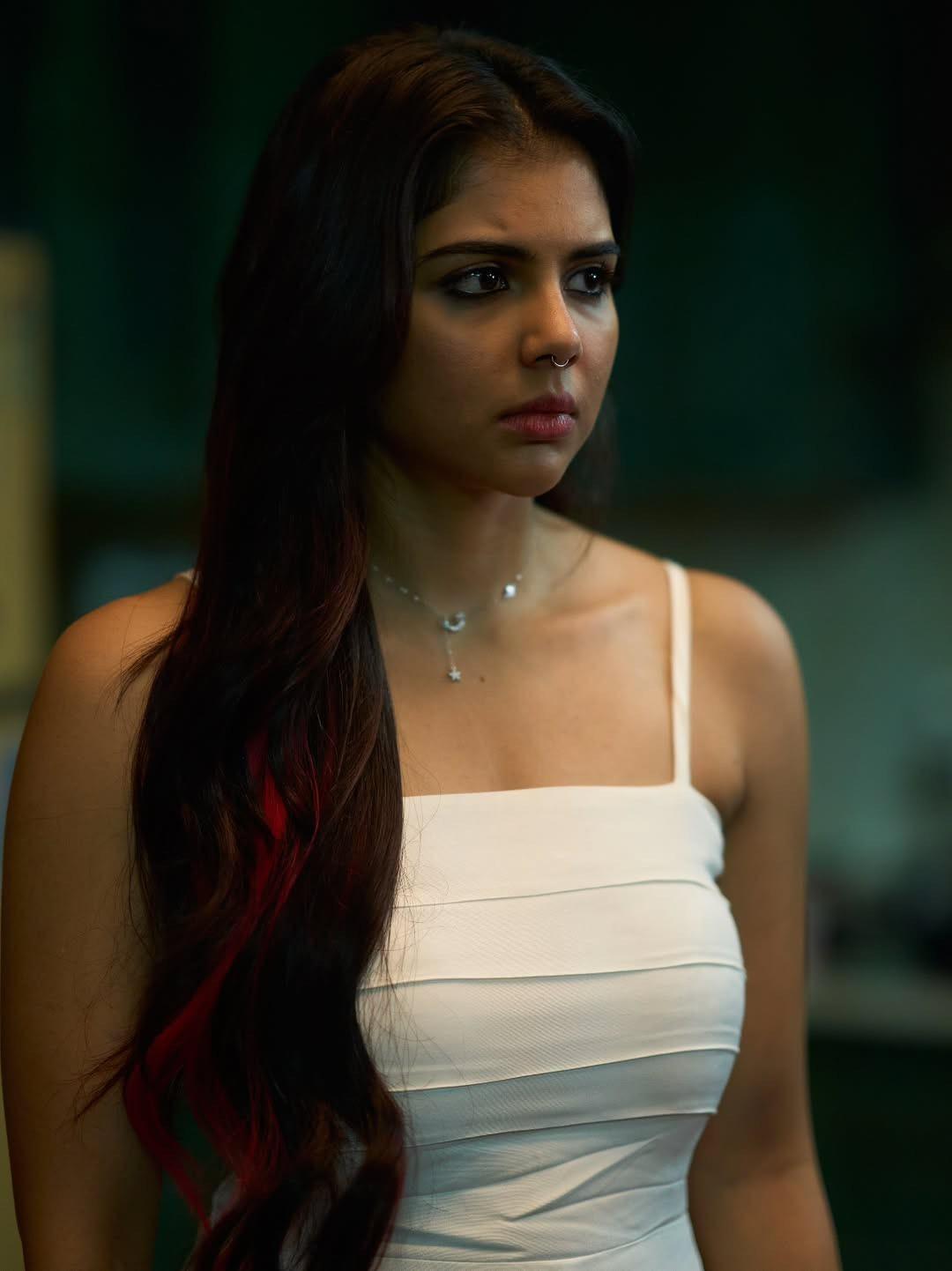 Kalyani Priyadarshan in White Dress Serious Look Image