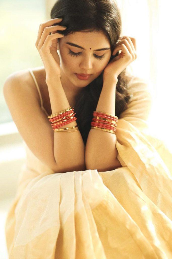 Kalyani Priyadarshan Pensive Look in Cream Saree Image