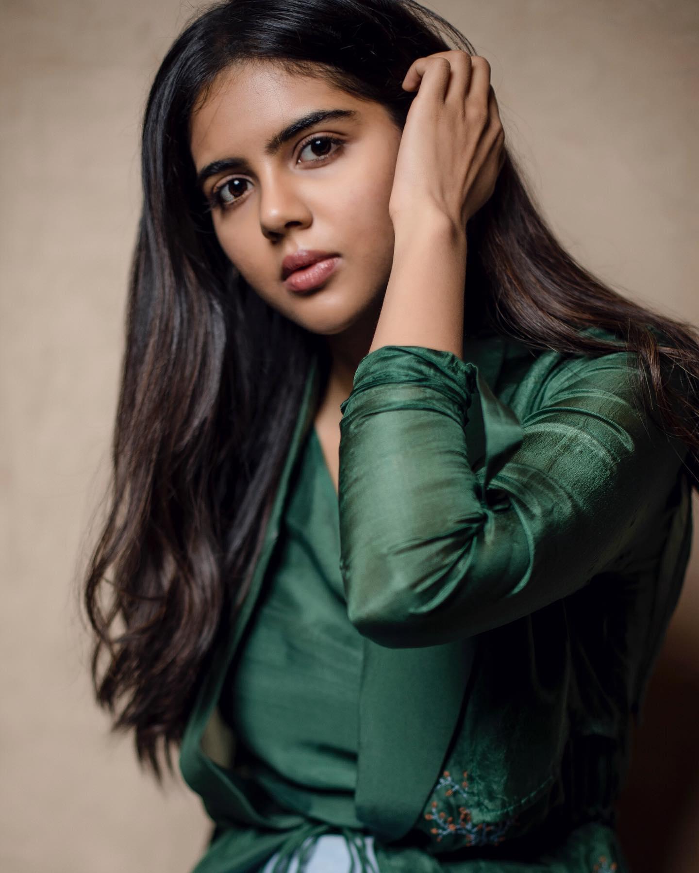 Kalyani Priyadarshan Posing in a Green Outfit Photo
