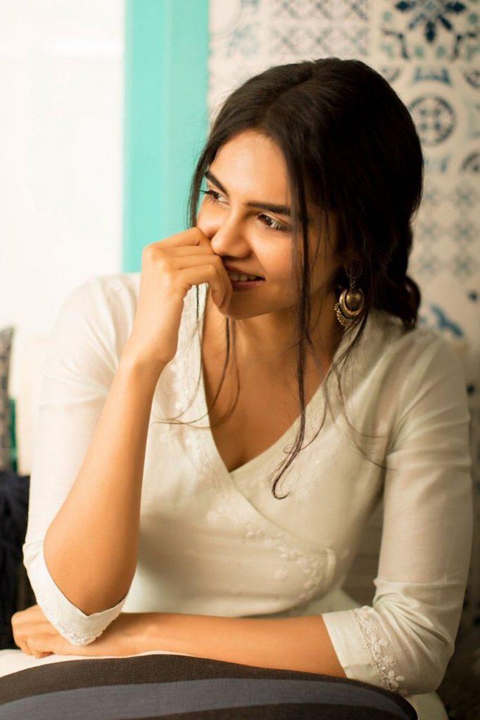 Kalyani Priyadarshan Shy Smile in White Outfit HD Image