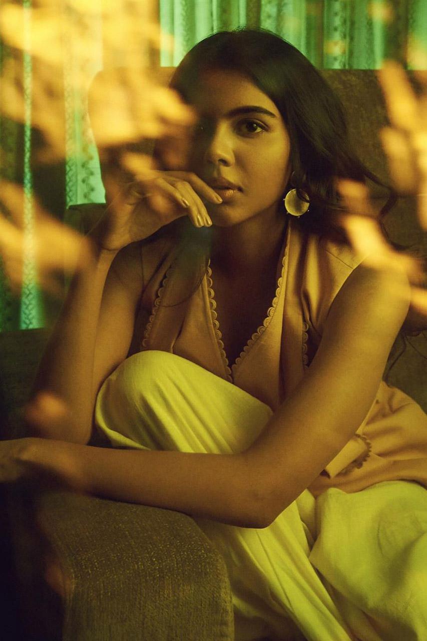 Kalyani Priyadarshan Sitting on Sofa free Wallpaper