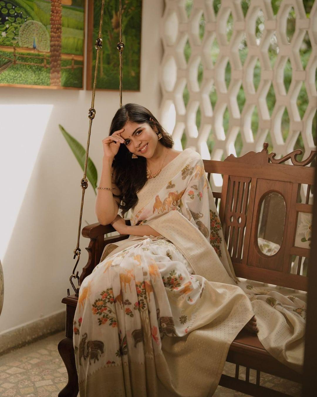 Priyadarshan Sitting on Wooden Swing with Smiling Face Pic