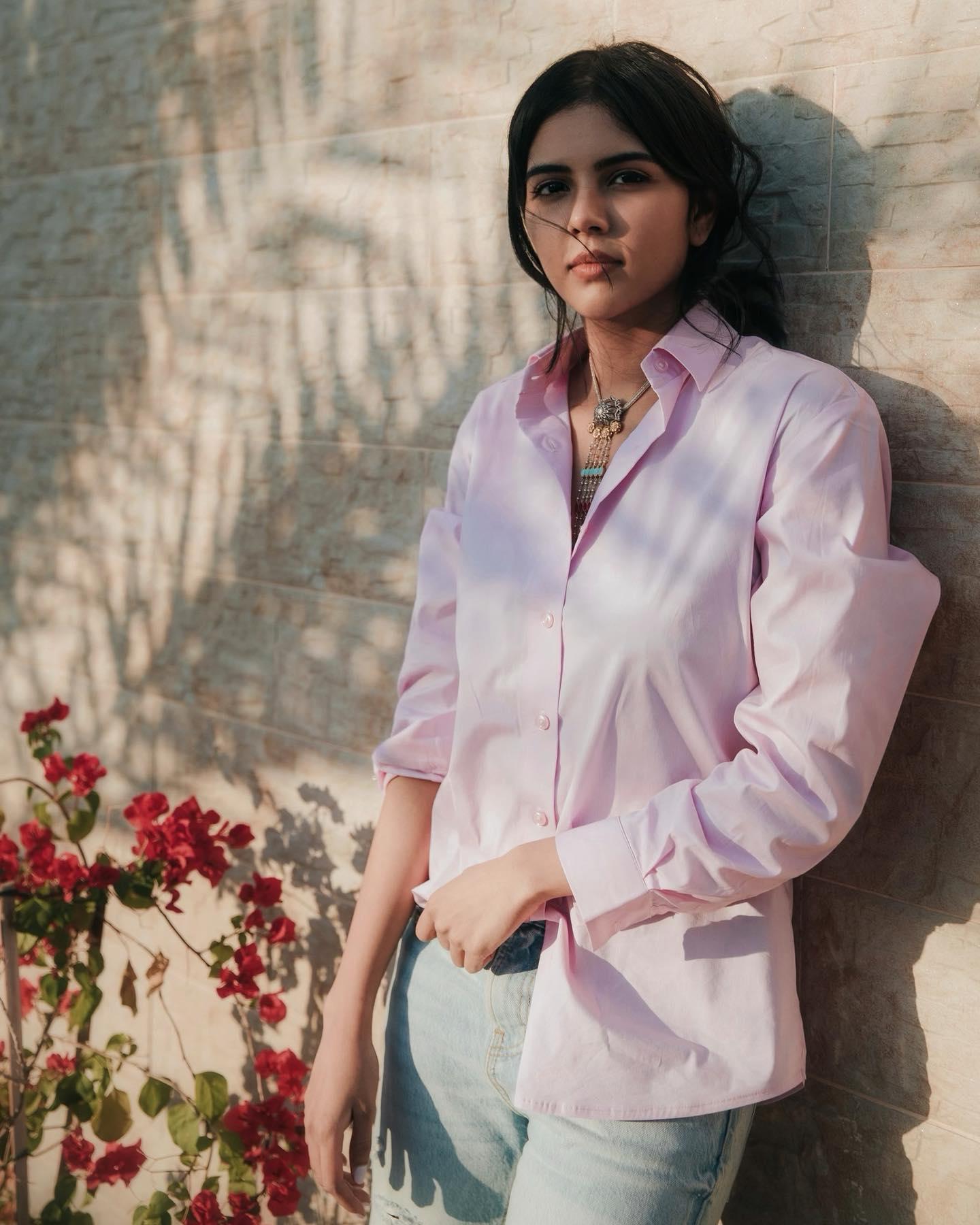 Priyadarshan Wearing Pink Dress with Floral Design Image