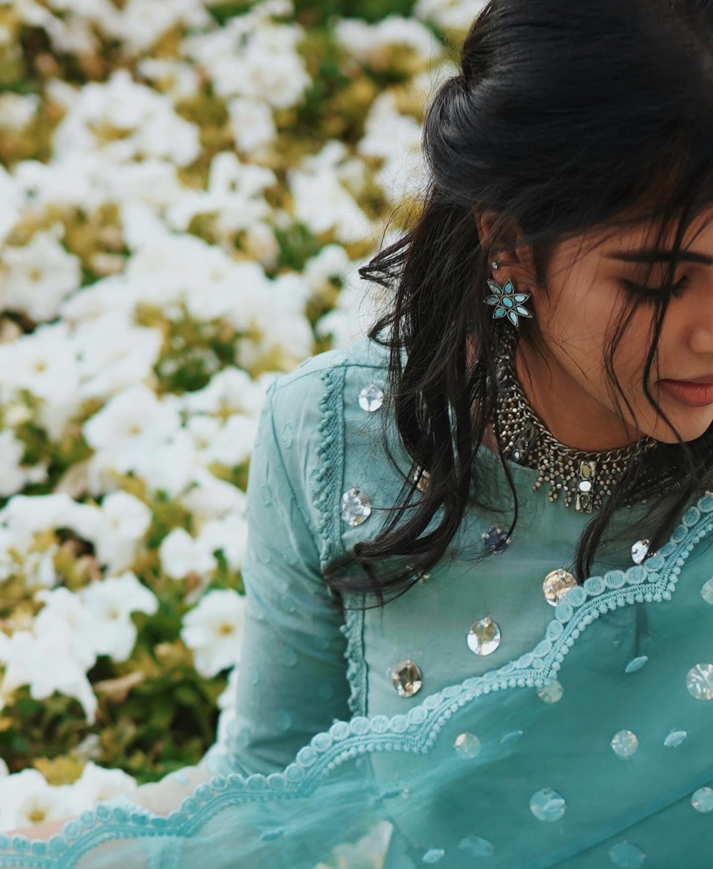 Priyadarshan with White Flower Background and Dress Image