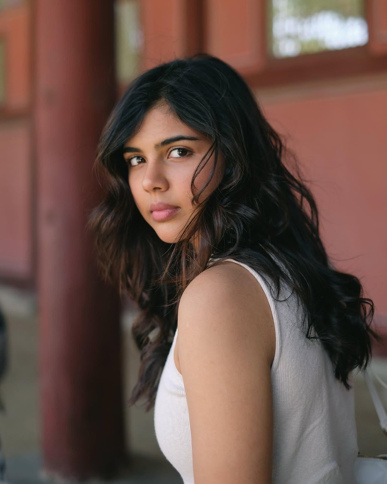 Serious Kalyani in White Outfit Looking Sideways Image