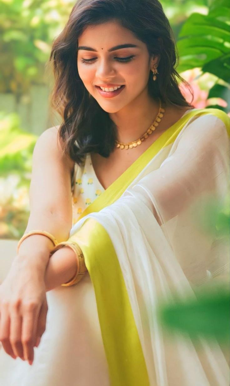 Smiling Kalyani in White Saree Near Nature View free Image