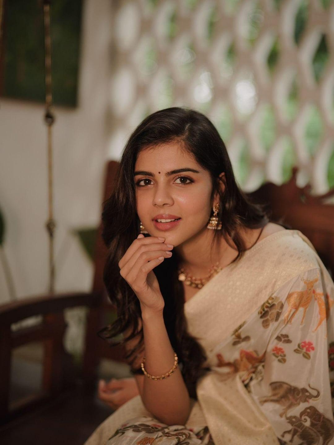 Smiling Kalynai in Printed Saree Indoor Pose free Image