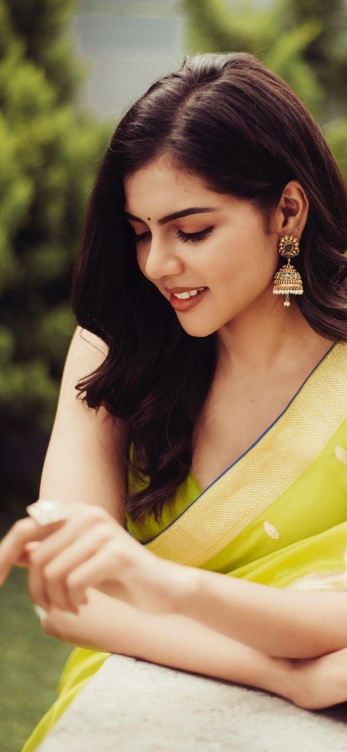 Smiling Priyadarshan in Yellow Saree Looking Down Image