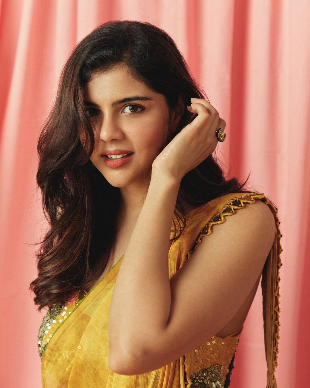 Stunning Pose of Kalyani Priyadarshan Hand on Hair Wallpaper
