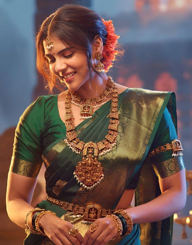 Traditional Priyadarshan in Green Saree with Jewelry Image